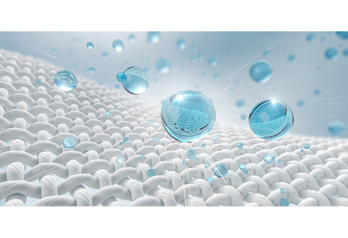 Απεικονίζονται σταγονίδια νερού πάνω σε ένα ύφασμα.